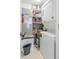 Laundry closet with washer, dryer, and storage shelves at 6287 Bahia Del Mar Cir # 208, St Petersburg, FL 33715
