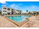 Refreshing community pool area with ample lounge chairs at 6287 Bahia Del Mar Cir # 208, St Petersburg, FL 33715