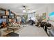 Spacious basement area features exercise equipment, storage, and a concrete floor at 808 Symphony Isles Blvd, Apollo Beach, FL 33572