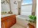 Bright bathroom featuring a large bathtub, stylish fixtures, and decorative accents for a spa-like experience at 808 Symphony Isles Blvd, Apollo Beach, FL 33572