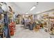 Workshop garage provides generous space for DIY projects with various tools and storage solutions at 808 Symphony Isles Blvd, Apollo Beach, FL 33572