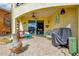 Covered patio includes outdoor seating, a grill, and beautiful waterfront access at 808 Symphony Isles Blvd, Apollo Beach, FL 33572