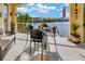 Waterfront patio boasts comfortable seating and picturesque views of the serene waterway at 808 Symphony Isles Blvd, Apollo Beach, FL 33572