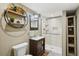 Modern bathroom with walk-in shower and floating shelves at 934 21St N Ave, St Petersburg, FL 33704
