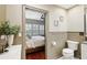 Clean bathroom with toilet and view into bedroom at 934 21St N Ave, St Petersburg, FL 33704