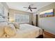 Bright bedroom featuring hardwood floors and a large TV at 934 21St N Ave, St Petersburg, FL 33704