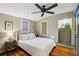 Cozy bedroom with ceiling fan and hardwood floors at 934 21St N Ave, St Petersburg, FL 33704
