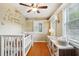 Charming Bedroom with crib and built-in storage at 934 21St N Ave, St Petersburg, FL 33704