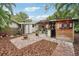 Charming brick patio with outdoor bar and dartboard at 934 21St N Ave, St Petersburg, FL 33704