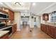 Open concept kitchen with stainless steel appliances and hardwood floors at 934 21St N Ave, St Petersburg, FL 33704