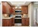 Updated kitchen featuring wood cabinets and granite countertops at 934 21St N Ave, St Petersburg, FL 33704