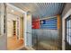 Unique laundry room with rustic features and a fun, sports-themed design at 934 21St N Ave, St Petersburg, FL 33704