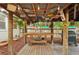 Rustic outdoor kitchen area under a covered patio with a prep table and grill at 934 21St N Ave, St Petersburg, FL 33704
