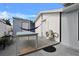 Relaxing backyard patio with hammock, table, and AC unit at 10114 Chimney Hill Ct, Tampa, FL 33615