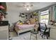 Bedroom with a double bed, desk and window at 10114 Chimney Hill Ct, Tampa, FL 33615