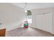 Well-lit bedroom with ceiling fan and ample closet space at 1050 Starkey Rd # 2701, Largo, FL 33771