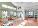 Spacious living room with hardwood floors and views of the backyard at 1050 Starkey Rd # 2701, Largo, FL 33771