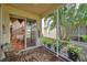 Spacious screened-in porch with view of the backyard and golf course at 1050 Starkey Rd # 2701, Largo, FL 33771