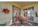 Relaxing screened porch with seating area, overlooking backyard at 1050 Starkey Rd # 2701, Largo, FL 33771