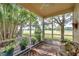 Relaxing screened porch overlooking a lush green golf course at 1050 Starkey Rd # 2701, Largo, FL 33771