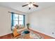 Cozy sitting room featuring a chaise lounge and a glass-top accent table at 1050 Starkey Rd # 2701, Largo, FL 33771