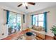 Relaxing sitting area with sliding doors leading to a private patio at 1050 Starkey Rd # 2701, Largo, FL 33771