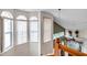 Upstairs hallway with large windows and a view to the living room at 1050 Starkey Rd # 2701, Largo, FL 33771
