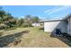 Spacious backyard with shed and AC unit at 10926 N Lantana Ave, Tampa, FL 33612