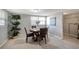 Charming dining room with a round table and four chairs at 10926 N Lantana Ave, Tampa, FL 33612