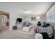Living room with sofa, chair, and coffee table at 10926 N Lantana Ave, Tampa, FL 33612