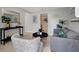 Spacious living room with gray seating, a console table and large mirror at 10926 N Lantana Ave, Tampa, FL 33612