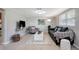 Living room with sofa, chair, and coffee table at 10926 N Lantana Ave, Tampa, FL 33612