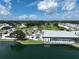 Community overview with clubhouse, pool, and golf course at 1100 Belcher S Rd # 190, Largo, FL 33771