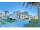 White single-wide manufactured home with carport and landscaped yard at 1100 Belcher S Rd # 190, Largo, FL 33771