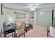 Bright guest room with sofa, desk, and ample closet space at 1100 Belcher S Rd # 190, Largo, FL 33771