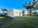 White single wide home with a spacious grassy backyard at 1100 Belcher S Rd # 190, Largo, FL 33771