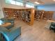 Community library with bookshelves and seating at 1100 Belcher S Rd # 190, Largo, FL 33771