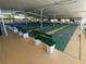 Community shuffleboard courts with benches at 1100 Belcher S Rd # 190, Largo, FL 33771