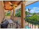 Private balcony overlooking the pool and lush landscaping at 1124 Seville Ne Ln, St Petersburg, FL 33704