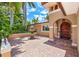 Elegant entryway with fountain and brick pavers at 1124 Seville Ne Ln, St Petersburg, FL 33704
