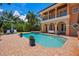 Large pool and spa with patio area at 1124 Seville Ne Ln, St Petersburg, FL 33704