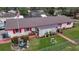 Aerial view of single-story home with spacious yard, RV parking, and pool at 12002 Washington St, Seffner, FL 33584