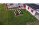 Backyard with garden beds and detached garage at 12002 Washington St, Seffner, FL 33584