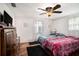 Cozy bedroom with two beds and wood floors at 12002 Washington St, Seffner, FL 33584