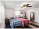 Serene bedroom with two twin beds and ceiling fan at 12002 Washington St, Seffner, FL 33584