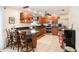 Updated kitchen featuring granite countertops and a breakfast bar at 12002 Washington St, Seffner, FL 33584