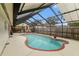Inviting screened pool area, perfect for relaxation and entertainment at 12002 Washington St, Seffner, FL 33584