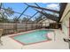 Relaxing screened pool with a spacious deck at 12002 Washington St, Seffner, FL 33584