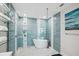 Spa-like bathroom featuring a walk-in shower and soaking tub at 145 Brightwater Dr # 2, Clearwater, FL 33767