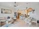 Open living space with kitchen, dining, and living areas at 145 Brightwater Dr # 2, Clearwater, FL 33767